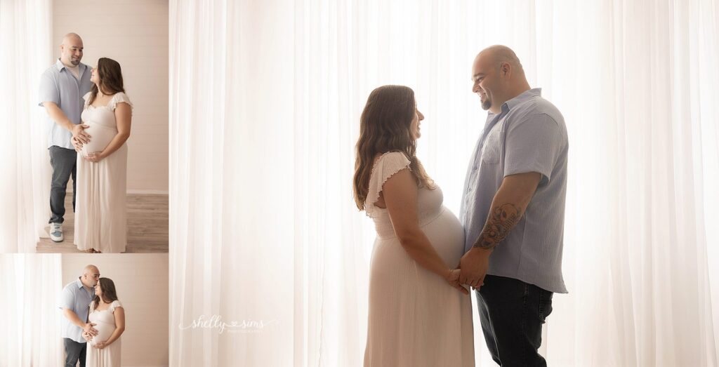 Mom and dad in Tulsa photography studio for maternity session
